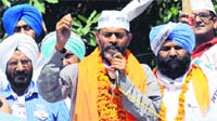AAP leader Yogendra Yadav campaigns for the party candidate from Anandpur Sahib Lok Sabha constituency, Himmat Singh Shergill, in Mohali on Thursday. A Tribune photograph