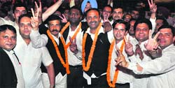 The newly elected office-bearers of the District Bar Association in a jubilant mood at the District Courts, Sector 43, in Chandigarh on Thursday. Tribune Photo