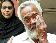 Relatives mourn for the family in their house in Zakir Nagar, New Delhi on Thursday