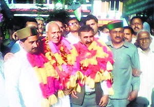 HPCC chief Sukhvinder Singh Sukhu and Chander Kumar on their arrival at Dadamb near Kangra on Thursday.