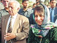 PDP patron Mufti Mohammad Sayeed and party president Mehbooba Mufti arrive to cast vote at the Bijbehara polling station in Anantnag on Thursday. Tribune photo: Yawar Kabli 