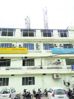 The mobile towers installed on a bank building in Ludhiana. 
