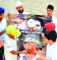 Young cricketers celebrate the birthday of ace cricketer Sachin Tendulkar in Ludhiana on Thursday.