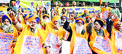 Ex-servicemen raise slogans, demanding implementation of the One Rank One Pension Scheme at Jantar Mantar in New Delhi
