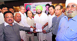 Congress candidate Captain Amarinder Singh at a function organised by the Punjab Beopar Mandal in Amritsar on Thursday night