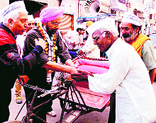 AAP candidate Dr Daljit Singh during an election campaign in Amritsar on Friday