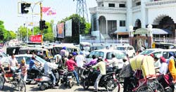 Commuters stuck in a traffic jam in Jalandhar on Friday. Tribune photo: Malkiat Singh