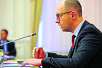Ukrainian Prime Minister Arseny Yatseniuk chairs a meeting in Kiev on Friday
