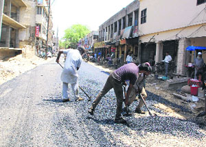 Making of roads in progress in Bathinda on Saturday.