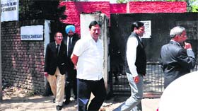 Members of the Juvenile Justice Board come out after inspecting the Childrens Home for Girls in Sector 15, Chandigarh, on Saturday