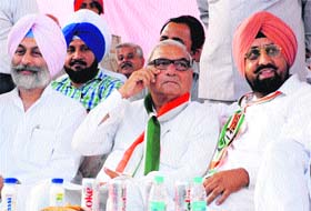 Bhupinder Singh Hooda, CM, Haryana, at a rally organised by the Congress in favour of Preneet Kaur, party candidate from Patiala, in Dera Bassi, on Saturday