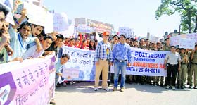 Students of Government Polytechnic College participate in a voters awareness rally in Sundernagar on Saturday.
