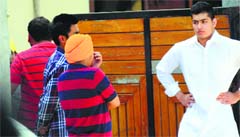 Grieving son (wearing orange turban) of Sunny Goodwill in Ludhiana. Tribune photo: Himanshu Mahajan