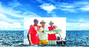 The crew aboard Lady Nana with the 25-kg dorado that was caught in Malindi, a Kenyan coastal town. The fish, steeped in mystery, is also known as mahi, a name that originated in Hawaii and means strong