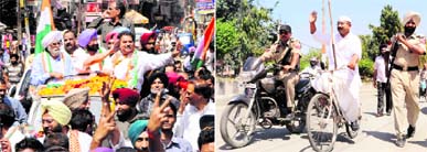 Capt Amarinder Singh during a road show; and (right) Sham Lal Gandhi pedals his cycle while his gunman rides a motorcycle during his campaigning in Amritsar.