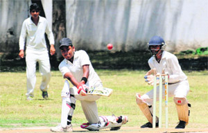 Players in action during the State Bank of Bikaner and Jaipur Cricket Tournament at Government Model Senior Secondary School, Sector 19, Chandigarh. 