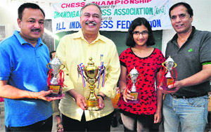 (From left) Sunil Bansal, Abhinandan Vohra, Tarini Goyal and Vipnesh Bhardwaj with their trophies in Chandigarh.