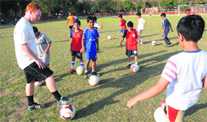 Scottish coach Stevie Grieve gives tips to young soccer players of Baichung Bhutia Football School at Football Stadium, Sector 17, Chandigarh