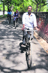 Ram Tirath pedals on a cycle track in Sector 26, Chandigarh.
