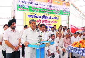 SEEKING PUBLIC SUPPORT: On his 67th birthday, Chief Minister Harish Rawat addresses an election meeting in Haridwar on Sunday