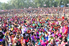 Women participate at a BJP rally in Dehradun