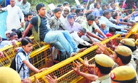 Demanding justice: Protesters raise slogans against the alleged police inaction in the case of a gang rape at Bhagana in Hisar, at Jantar Mantar in New Delhi on Sunday