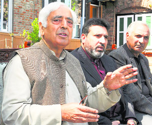 PDP patron Mufti Mohammad Sayeed addresses mediapersons at his Gupkar residence in Srinagar on Sunday.