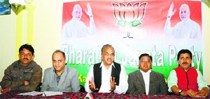 BJP state vice-president Ramesh Arora addresses a press conference in Srinagar on Sunday. 