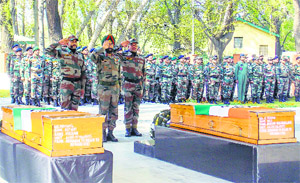 Salute to martyrs: Officers of the 15 Corps pay tributes on Sunday to the two soldiers killed in Shopian encounter on Friday.