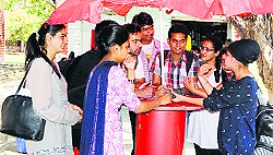 Guru Nanak Dev University students put their point of view about elections on the campus in Amritsar
