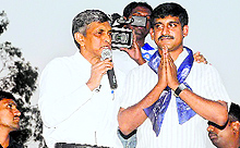 N Jayaprakash Narayan (with a mike in his hand) of the Lok Satta canvasses for a party candidate