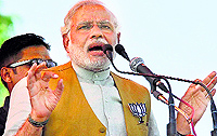 BJP prime ministerial candidate Narendra Modi during an election rally in Unnao on Sunday