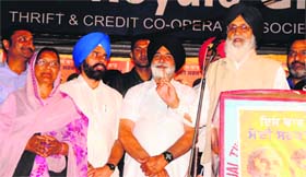 Chief Minister Parkash Singh Badal addresses a gathering in support of SAD candidate Paramjit Kaur Gulshan at Rampura Phul