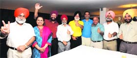 The newly elected members of the Executive Committee with elected president Birinder SIngh Gill (extreme left) in a jubilant mood at Chandigarh Golf Club
