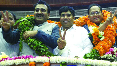 Newly elected Mayor Yogender Chandolia (C), Deputy Mayor Ravindra Gupta (L) and Standing Committee member Dr Sanjeev Naiyyar of the North Delhi Municipal Corporation at Civic Centre in Delhi on Monday.