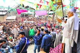 PDP patron Mufti Mohammad Sayeed addresses party workers in Budgam where he was campaigning for Srinagar candidate Tariq Hameed Karra on Saturday
