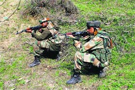 Army personnel at the encounter site in Shopian