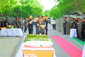 Lt Gen Sanjiv Chachra, GOC-in-C, Northern Command, pays tributes on Monday to the two soldiers killed in Shopian encounter on Friday