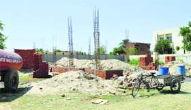 A shelter being built for housing stray dogs during their sterilisation and postoperative care near the veterinary hospital of the municipal corporation in Ludhiana.