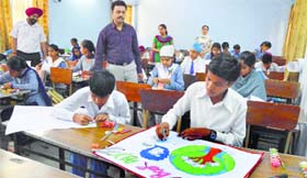 Students of government schools take part in a district-level poster-making competition at Government (Multipurpose) Senior Secondary School in Ludhiana on Monday.