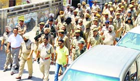 The Jagraon  police personnel sought residents cooperation to ensure violence-free elections.