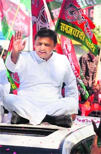 Akhilesh Yadav during a road show in Lucknow on Monday.