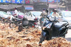 Parking of vehicles continues despite a stretch of near Cristal Chowk is dug up in Amritsar