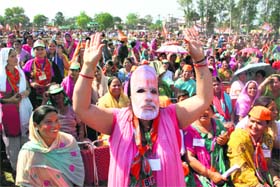 BJP supporters at an election meeting in Dehradun on Tuesday