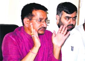 Former state Congress minister Kishore Upadhyaya addresses mediapersons in Haridwar on Tuesday