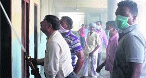 Fireman control flames at Civil Hospital in Jalandhar on Tuesday.