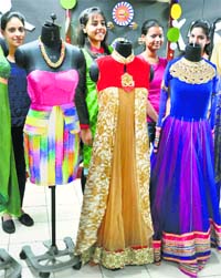 Students of the Sportking Institute of Fashion Technology showcase their creations during a 