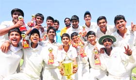 Players of the Panchkula District Cricket Association in a jubilant mood after winning the tournament at Sector 16, Chandigarh, on Wednesday.