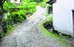 A rural road near Baijnath is a picture of neglect. Photo by writer