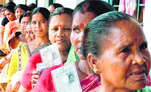 Voters queue up at a polling station in Singur, 45 km north of Kolkata, on Wednesday. 